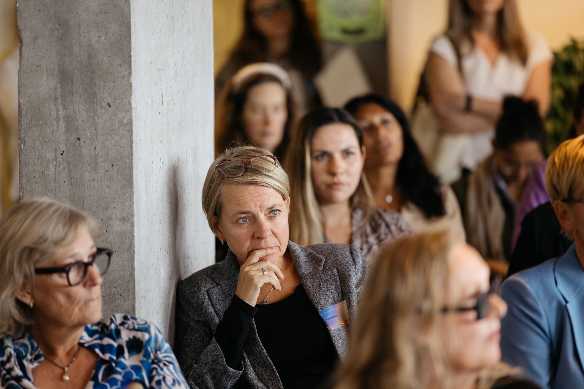 Participants listening during a women’s health discussion